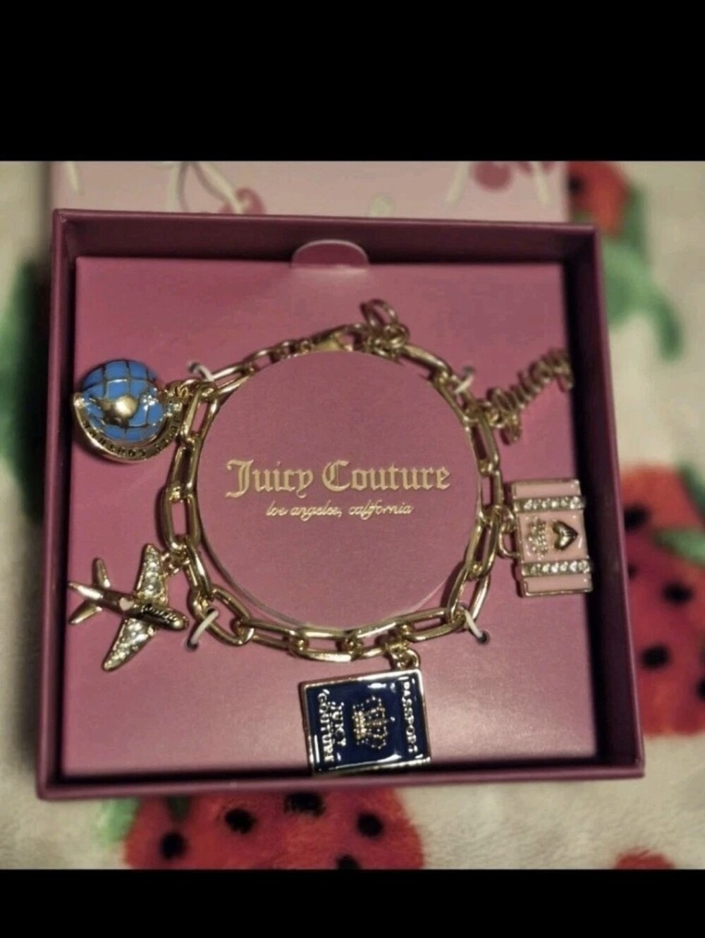Juicy Couture Gold-Tone Link Bracelet with Pink & Navy Passport & Planr Charms